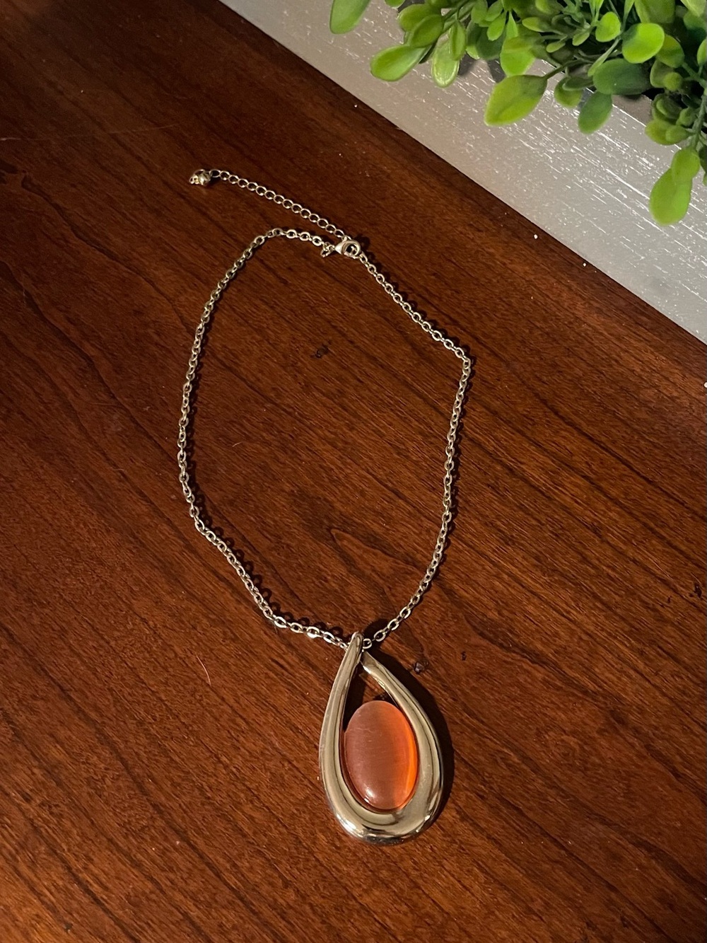 Gold toned Teardrop Necklace with Orange Stone